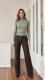 Front view of sage green high neck knit sweater