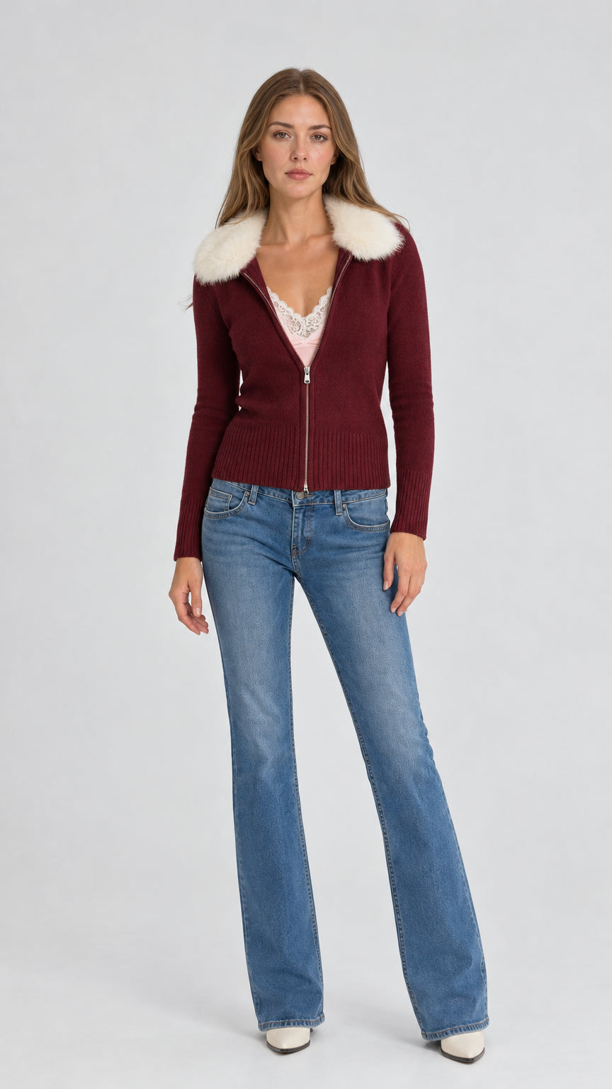 Front view of model wearing burgundy faux fur collar zip cardigan with jeans