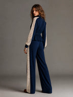 Elegant Navy Vertical Ribbed Knit Two Piece Outfit Zip Front Peplum Top Off White Floral Lace Panel Wide Leg Pants